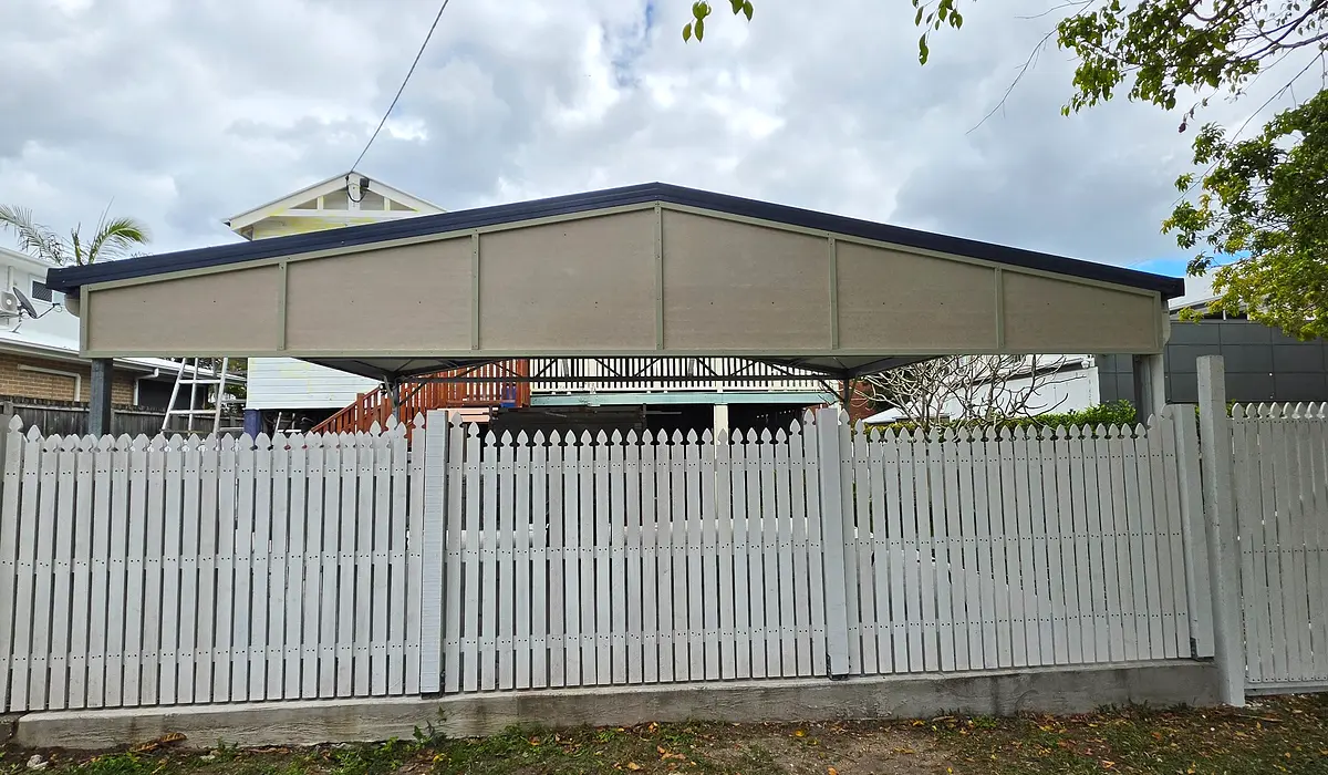 Completed residential carport with a clean gable roofline