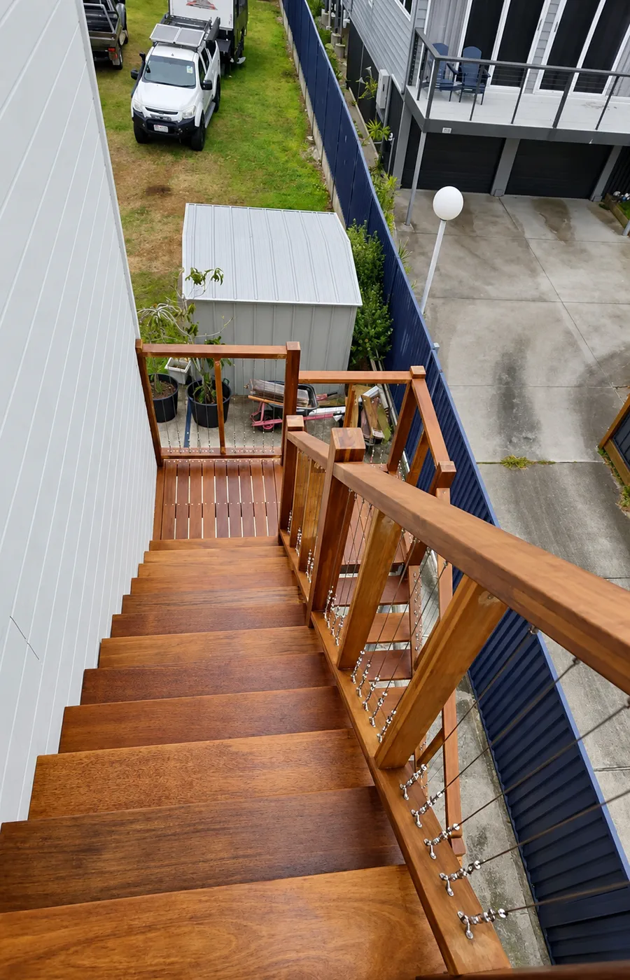 Completed external timber staircase and landing viewed from above